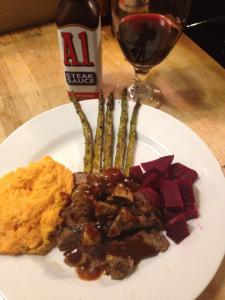 Recording Artist Ava Aston - thanksgiving dinner including a london broil steak with A-1 Steak Sauce, asparagus, sweet potatoes, beets and a glass of wine.